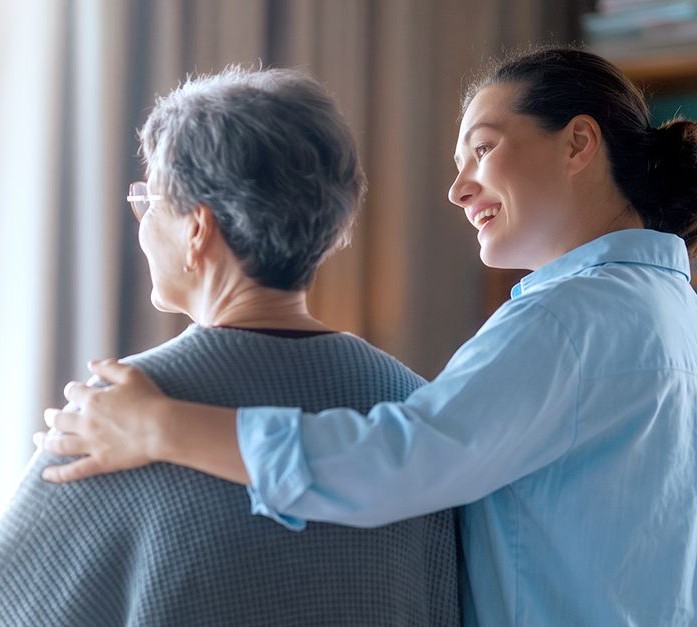 Caregiver supporting an older adult